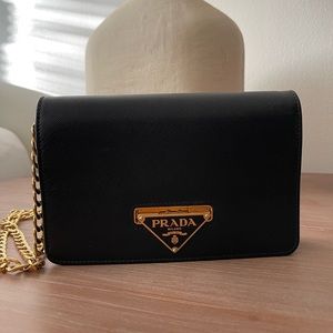 PRADA
Black Saffiano Leather Flip Lock Wallet on Chain Clutch Bag